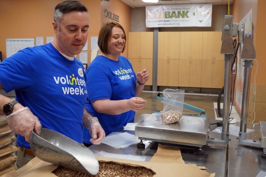 Scooping rice at the food bank