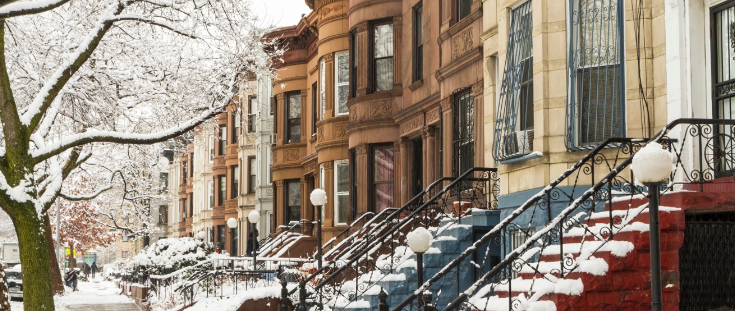 winter cityscape brownstones in snow