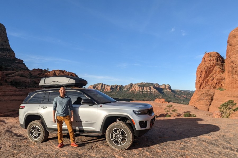 Employee Kevin Liu with vehicle