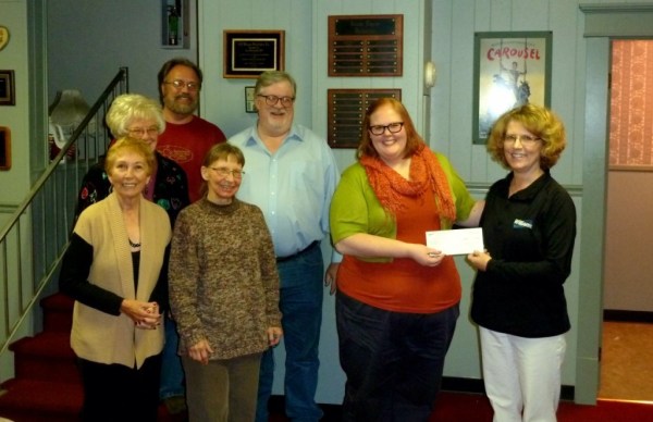 Williams employee Carolyn presents the grant check from Williams to ArtsLink Vice President Miranda Stokes. Also pictured are ArtsLink board members Marianne Hughes, Barbara Vincent and Dan Henthorn. 
