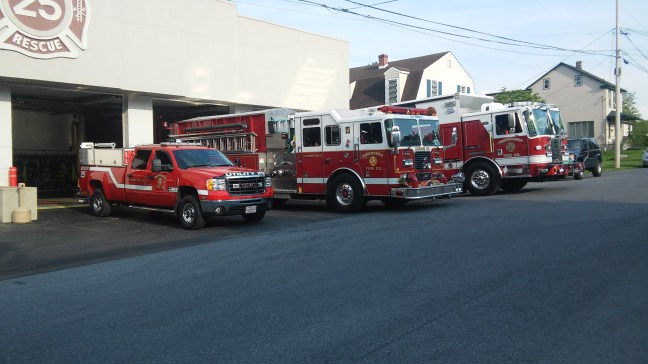 Photo of fire trucks and fire station
