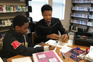 Youth using robotics program