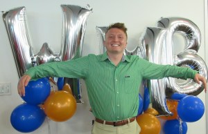 Intern Andrew with WMB balloons