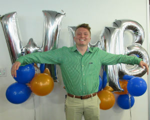 Intern Andrew with WMB balloons