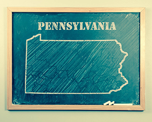 Outlined Pennsylvania US state on grade school chalkboard