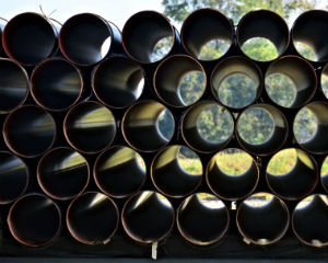 Pipes stacked in a yard