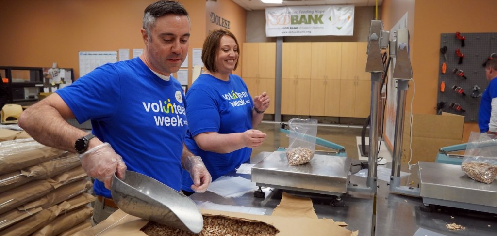 Scooping rice at the food bank